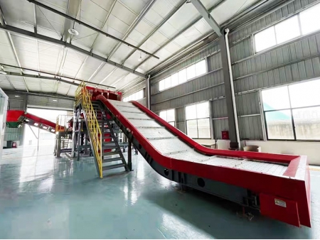 Transportador de placas metálicas