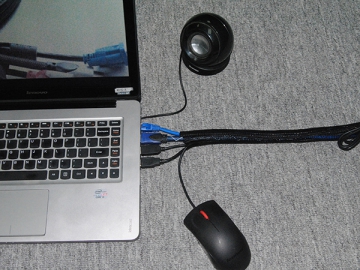 Envoltório trançado de fecho automático